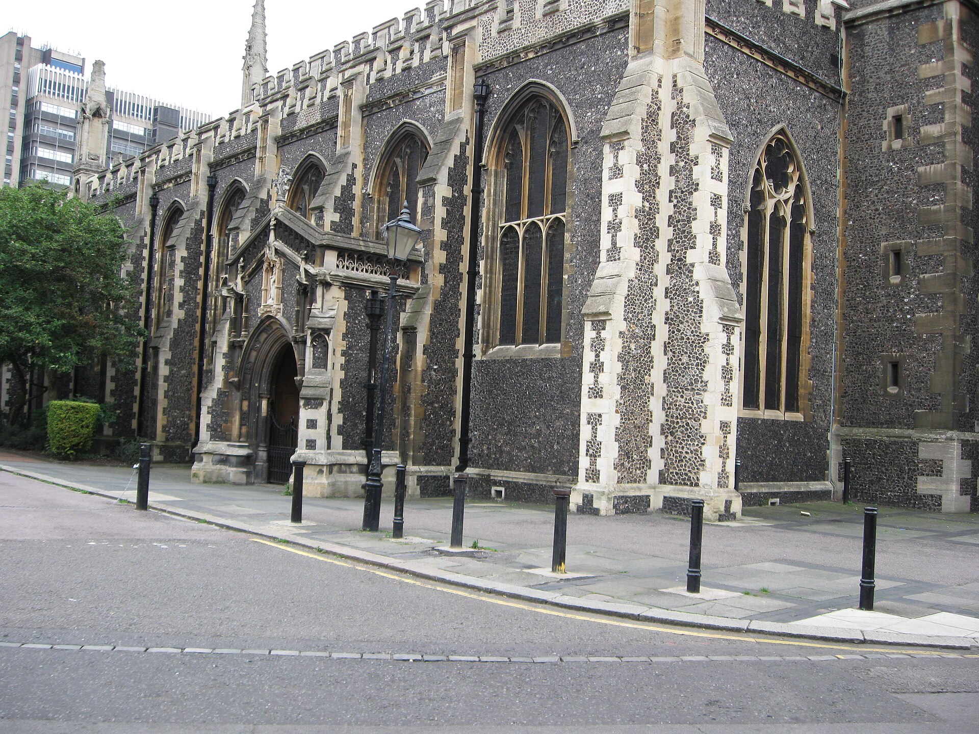 Croydon Minster, a large flint church, seen from the street